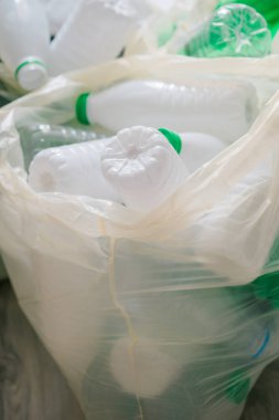 Used white and green plastic in the white bags