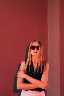 Young beautiful  woman with long natural hair on the street