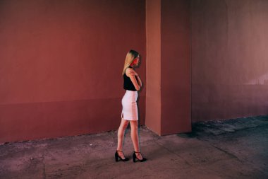 Young beautiful  woman with long natural hair on the street
