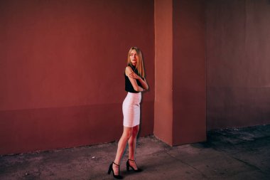 Young beautiful  woman with long natural hair on the street