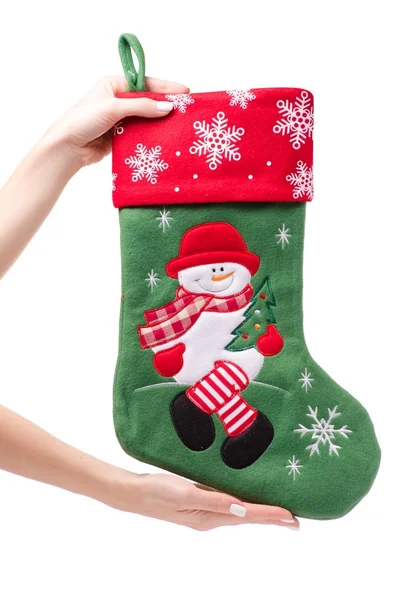 Christmas decoration gift sock in hand isolated — Stock Photo, Image
