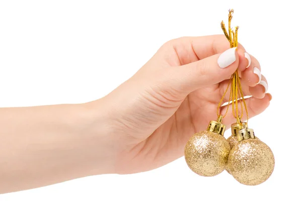 Χρυσές Χριστουγεννιάτικες μπάλες διακόσμηση στο χέρι — Φωτογραφία Αρχείου