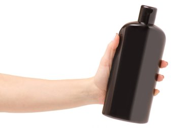 A dişi içinde saç şampuanı bir şişe el