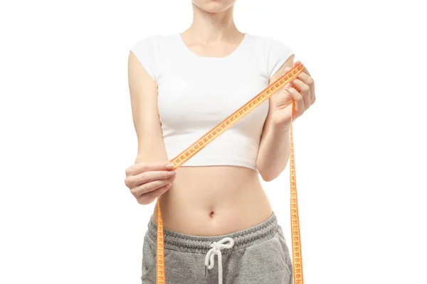 Kobieta traci wagi szczupłość centymetr — Zdjęcie stockowe