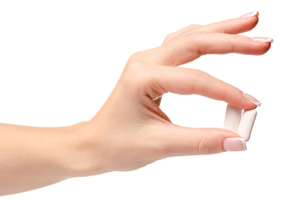 Female hand chewing gum — Stock Photo, Image