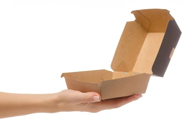 Kotak untuk burger di tangan perempuan — Stok Foto