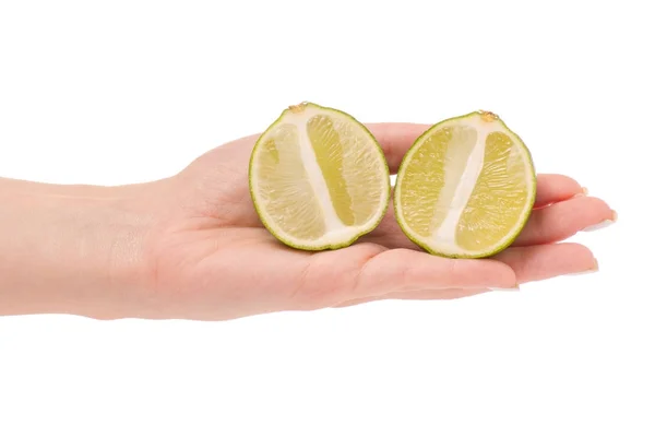 Limes in hand — 图库照片