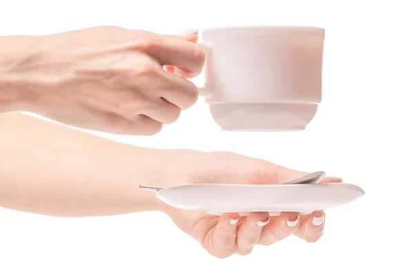 Coupe et soucoupe avec une cuillère à café dans les mains thé café — Photo