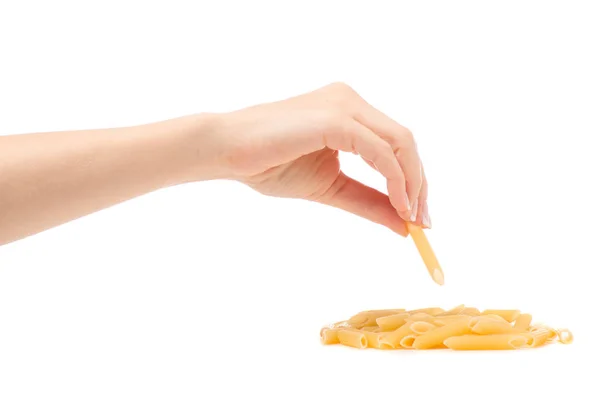 Vrouwelijke hand met een pasta — Stockfoto