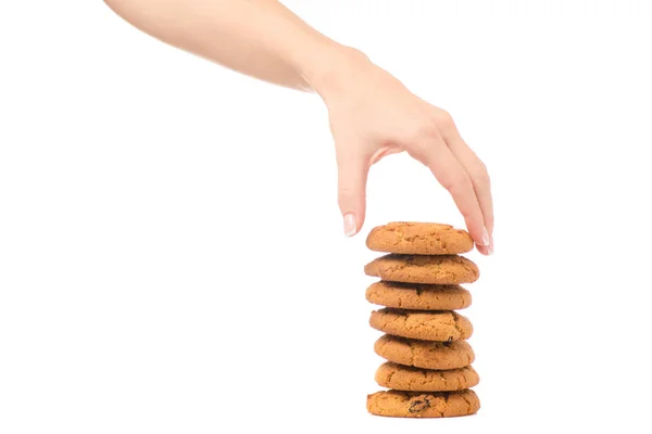 分離されたレーズンとクッキーを持っている女性の手 — ストック写真