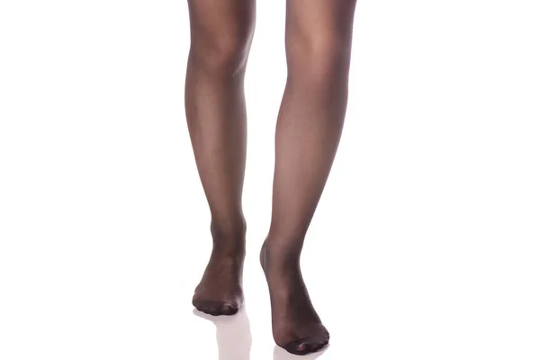 Жіночі ноги чорні панчохи колготки — стокове фото