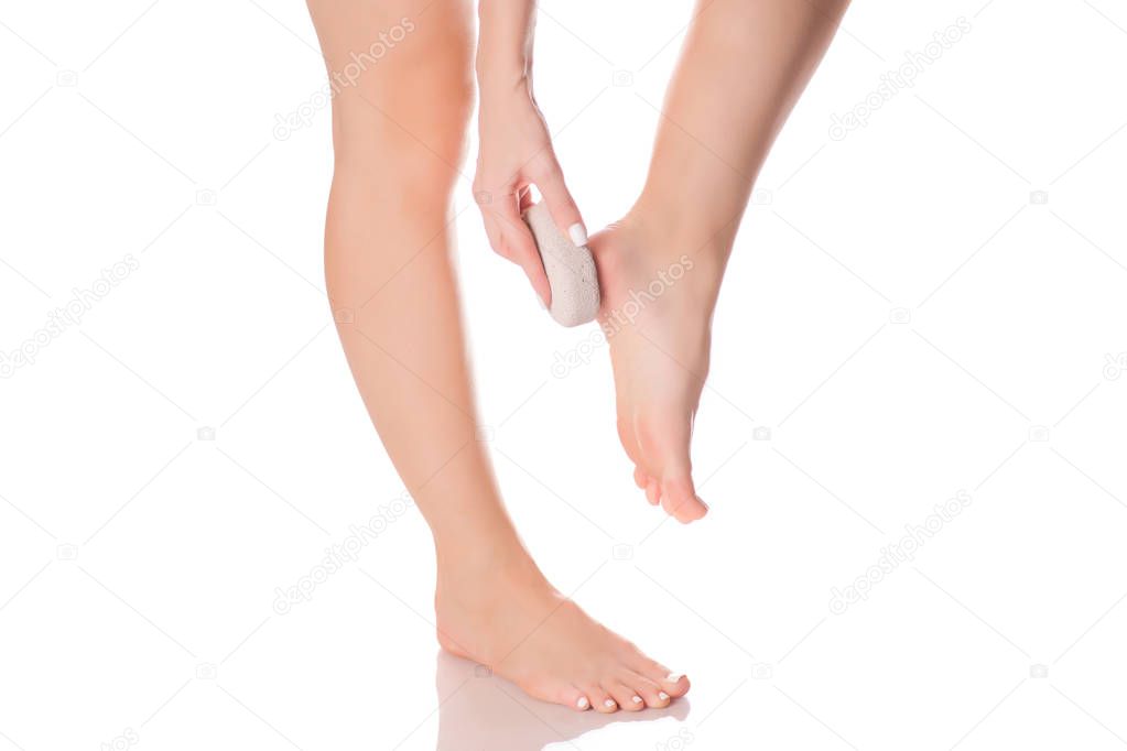 Female feet heel stone pumice