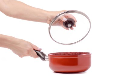 Bir kepçe elinde bir pan