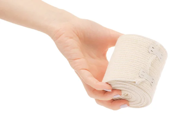 Rolo bandagem elástica na mão — Fotografia de Stock