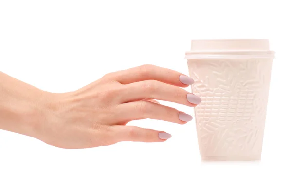 Eine Kaffeetasse aus Pappe mit Schneeflocken in der Hand — Stockfoto