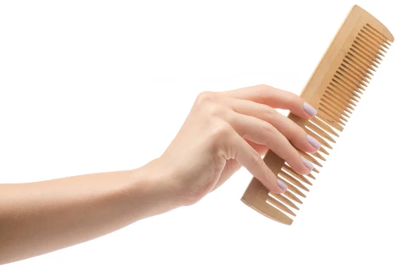 Femmina mano pettine di legno — Foto Stock