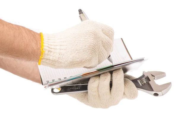 Mężczyzna ręce w narzędzia Pióro Notatnik rękawice budowlane budynku — Zdjęcie stockowe