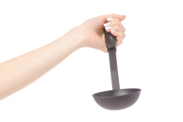 Ženská ruka drží kuchyňské scoop — Stock fotografie