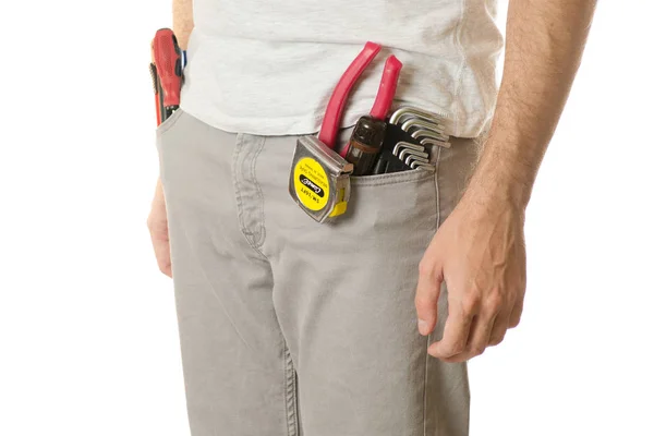 Hombre en un bolsillo construyendo herramientas —  Fotos de Stock