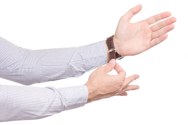 Чоловічої руки годинник — стокове фото