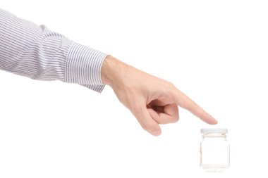 Küçük bir kavanoza ile erkek el