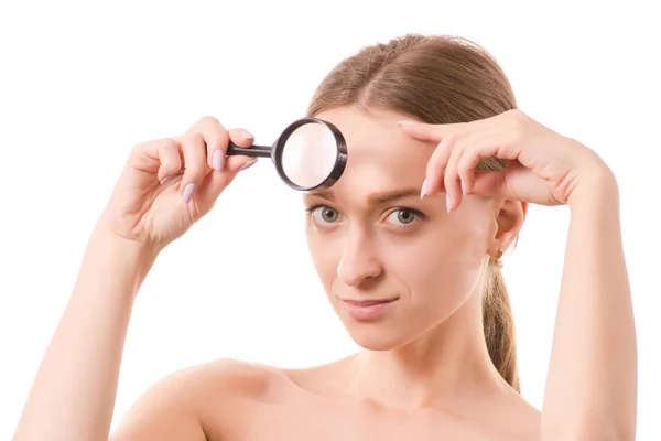 Beautiful young woman beauty face skin magnifier — Stock Photo, Image