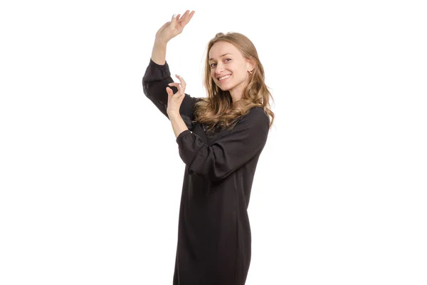 穿黑色连衣裙的女孩在跳舞 — 图库照片