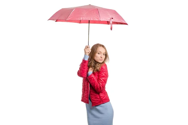 Ung kvinna i en jacka med en paraply-regn — Stockfoto