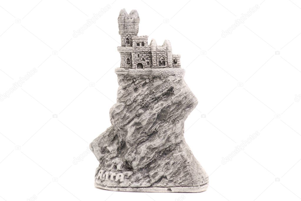 Statue of a castle on a mountain