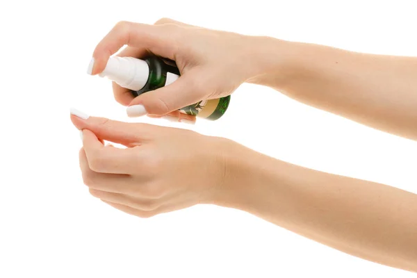 Женские волосы ногтей маслом для рук с диспенсером — стоковое фото