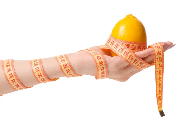 Λεμόνι εκατοστό στο χέρι υγείας, απώλεια βάρους — Φωτογραφία Αρχείου