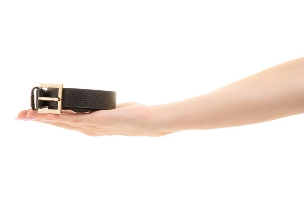 Female belt in a female hand