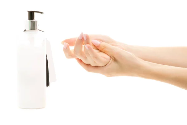 Handkräm med dispenser kvinnliga händer — Stockfoto