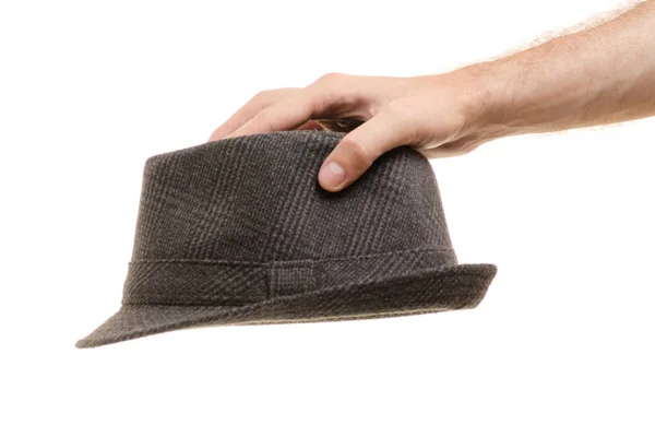 Καπέλο σε αρσενικό χέρια απομονωμένες — Φωτογραφία Αρχείου