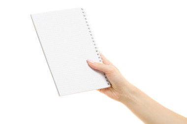 Beyaz el içinde açık defter