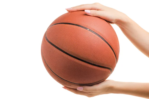 Basketball in a female hand — Stock Photo, Image