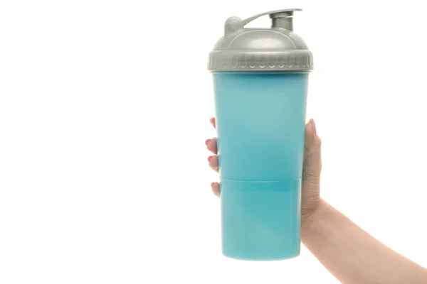 Blå sport shaker kvinnlig hand — Stockfoto