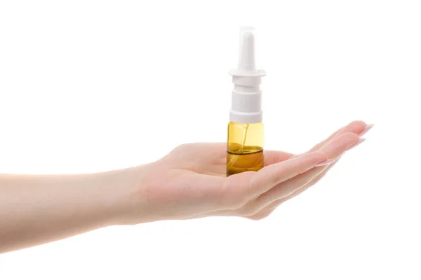 Spray voor neus in vrouwelijke hand — Stockfoto