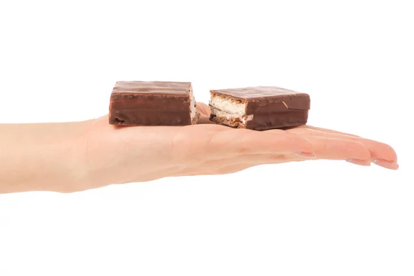 Schokoladenkuchen Bonbons Keks Milch in der Hand — Stockfoto