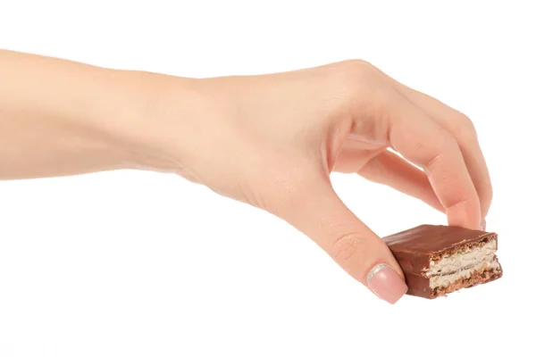 Schokoladenkuchen Bonbons Keks Milch in der Hand — Stockfoto