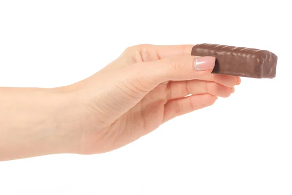 Quark in Schokoladenglasur in der Hand — Stockfoto