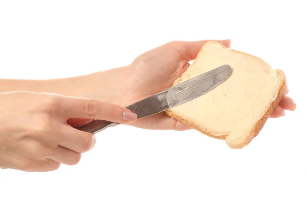 Kenyeret, vajat késsel a kezében — Stock Fotó