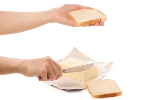 Brot mit Buttermesser in der Hand — Stockfoto