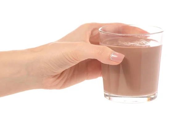 Un verre de chocolat cacao au lait à la main — Photo