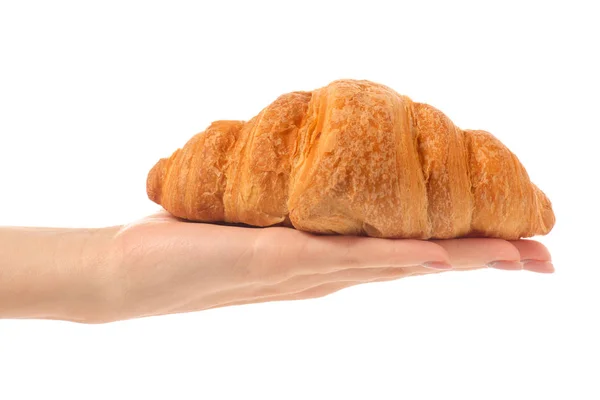 Croissant jídlo sladkosti v ruce — Stock fotografie