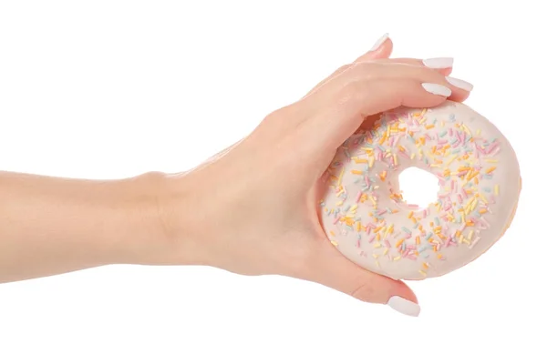 Donuts doçura geada na mão — Fotografia de Stock