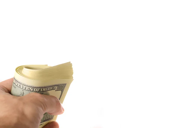 Un paquete de dinero en la mano — Foto de Stock
