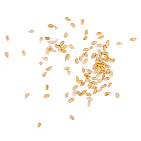 Beyaz arkaplanda ayçiçeği tohumları