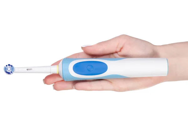 Electric toothbrush in hand — Stock Photo, Image