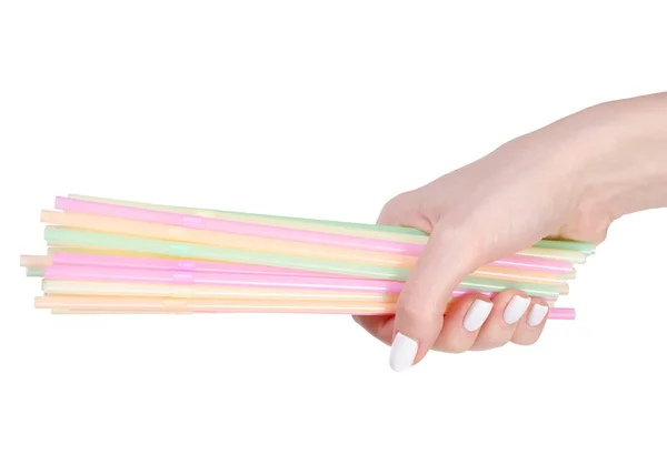 Vícebarevné koktejl sláma v ruce — Stock fotografie